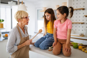 Grandmother is scolding her grandchildren